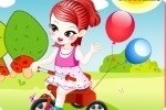 Bambina sul triciclo Bambina sul triciclo